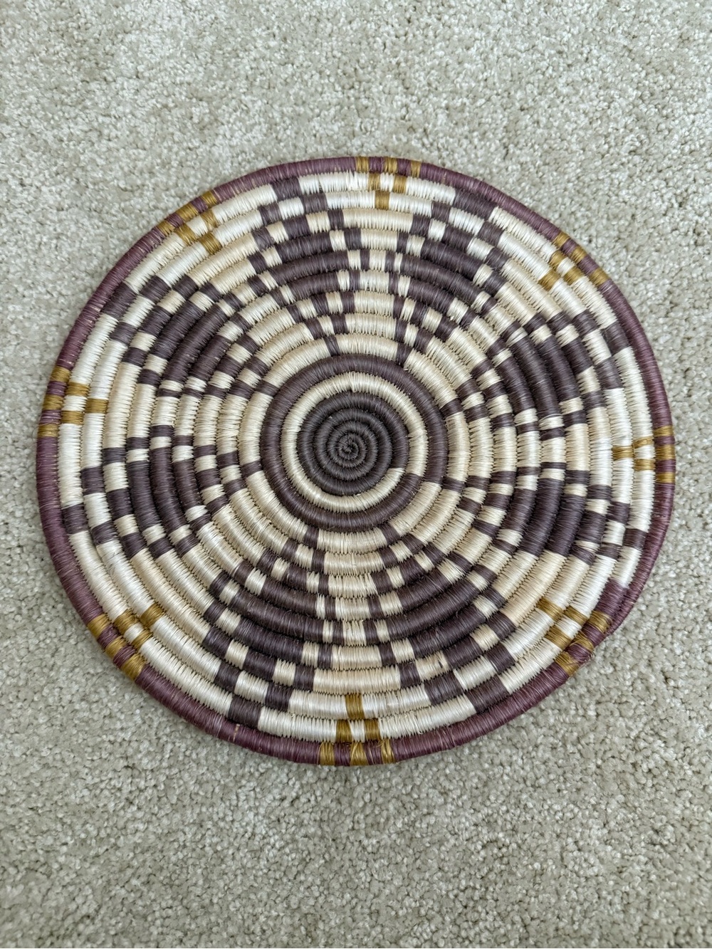 Handcrafted woven African Coil trivet wall hanging decor purple